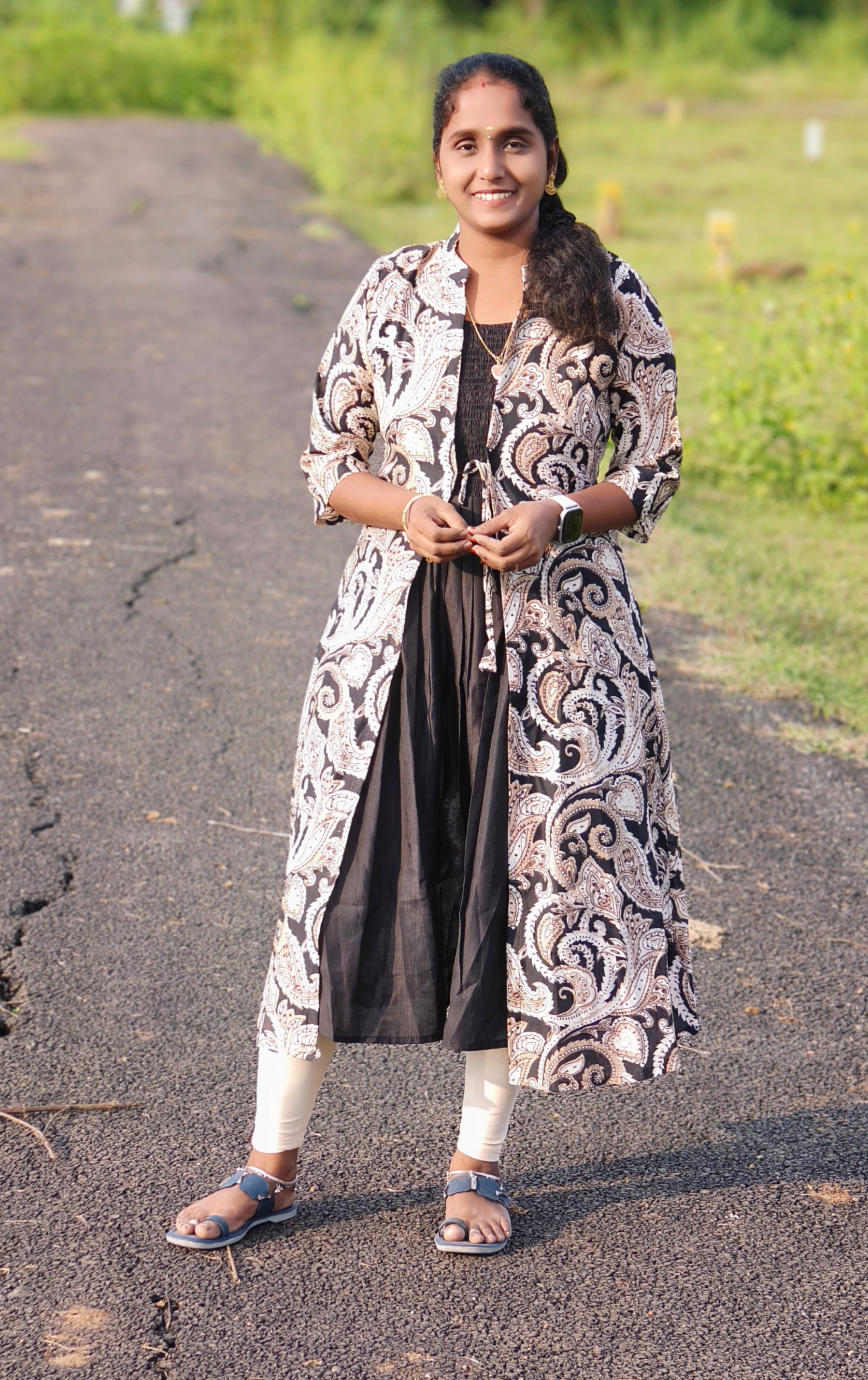Black overcoat model for Vatican Kurtis