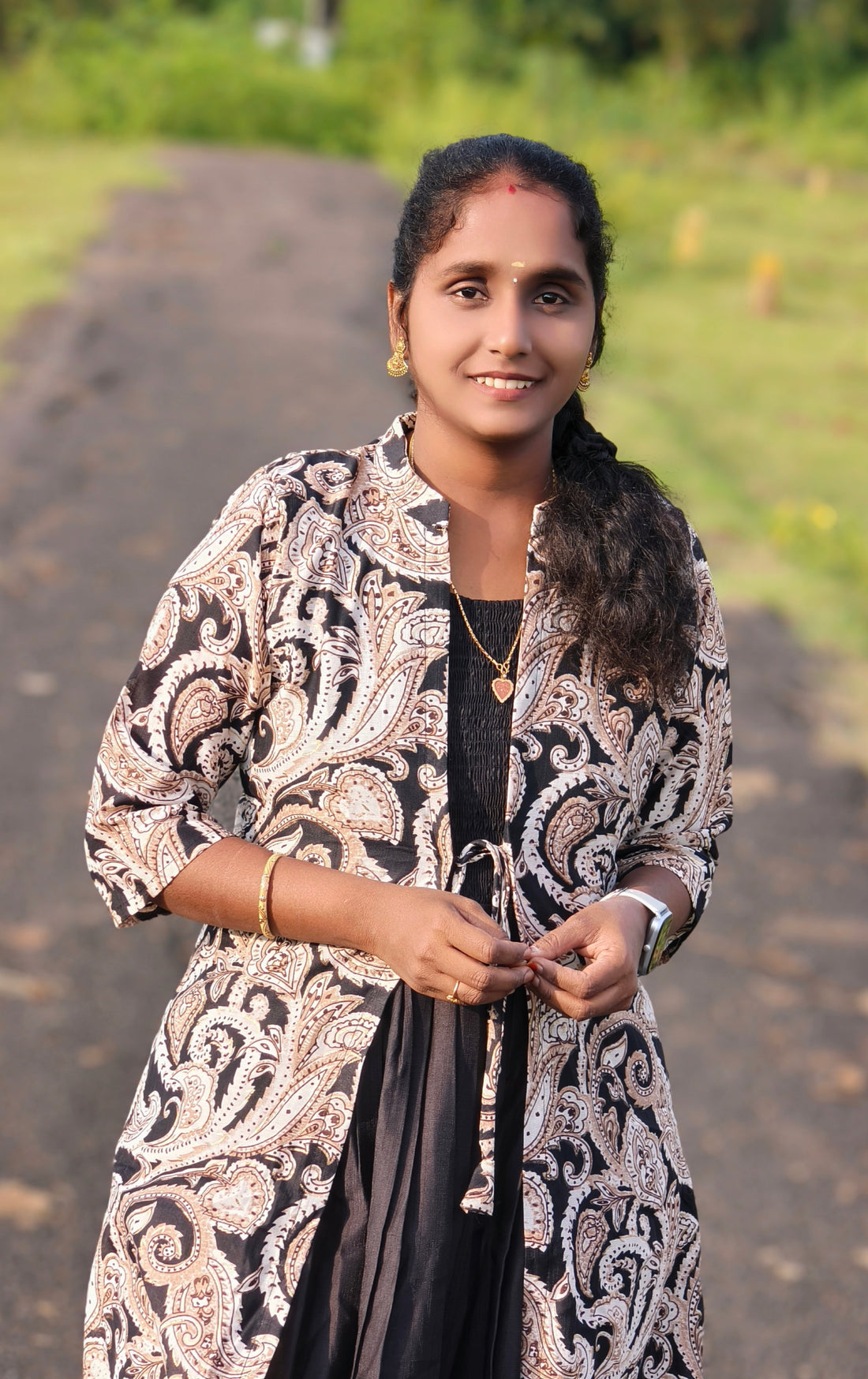 Black overcoat model for Vatican Kurtis